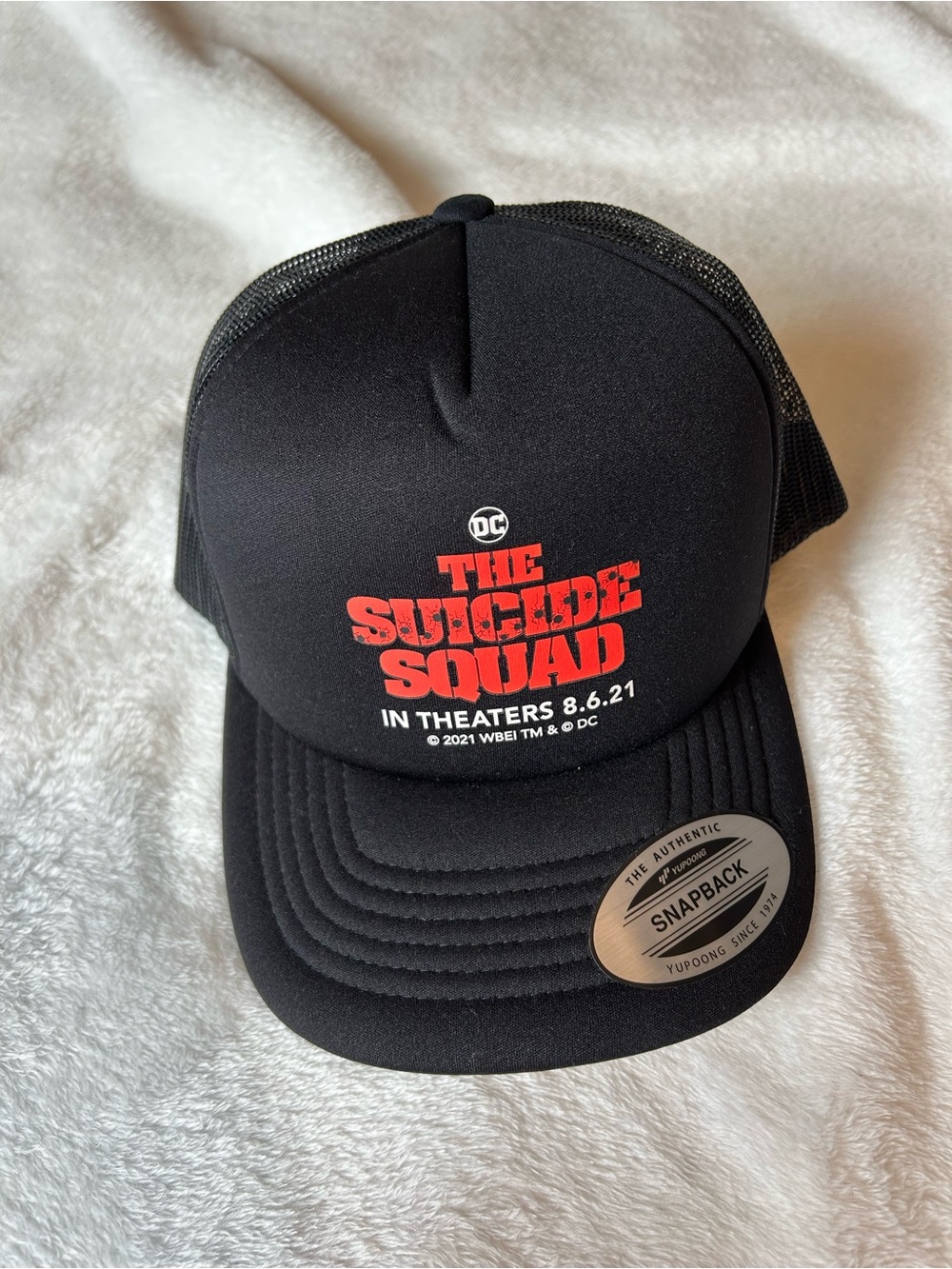 The Classic Black Mesh Trucker Cap with Gold Logo